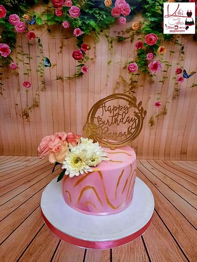 "Marbel cake with flowers" - Cake by Noha Sami