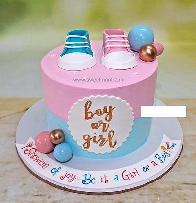 Baby Shower cake with pink and blue shoes - Cake by Sweet Mantra Homemade Customized Cakes Pune