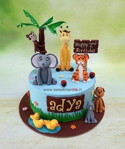 Jungle theme cake with animals - Cake by Sweet Mantra Homemade Customized Cakes Pune