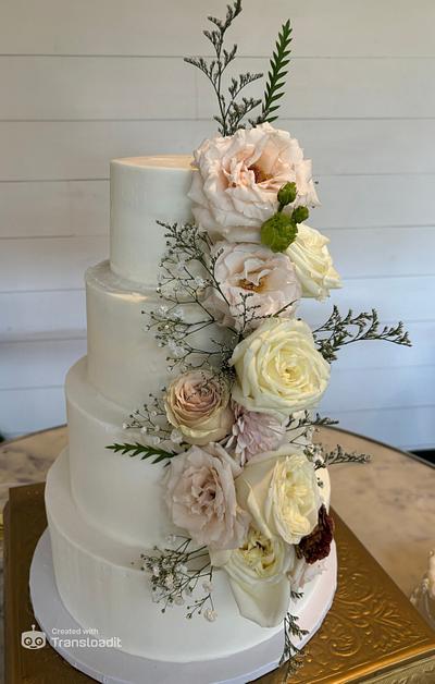 Four tiered buttercream wedding cake with fresh flowers - Cake by Artful Cakery by Julie