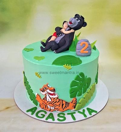 Mowgli cake in cream - Cake by Sweet Mantra Homemade Customized Cakes Pune