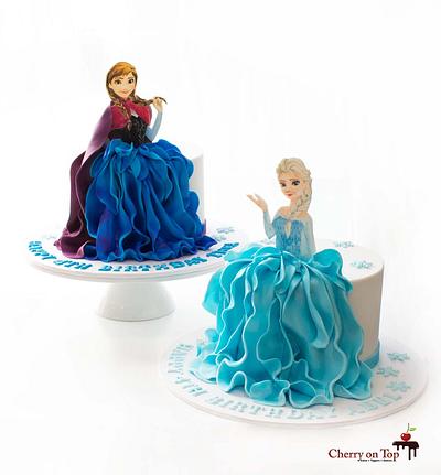 Elsa and Anna cakes for beautiful twins 🥳❄️❄️❄️❄️ - Cake by Cherry on Top Cakes
