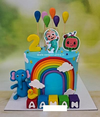 Cocomelon rainbow cake in cream - Cake by Sweet Mantra Homemade Customized Cakes Pune