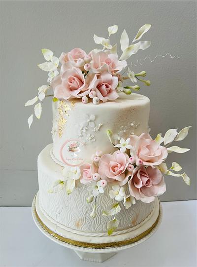 White with dusty pink for a special birthday  - Cake by Inoka (Sugar Rose Cakes)
