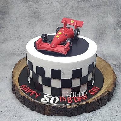 Formula 2 car theme on whipped cream cake. - Cake by Realicious5
