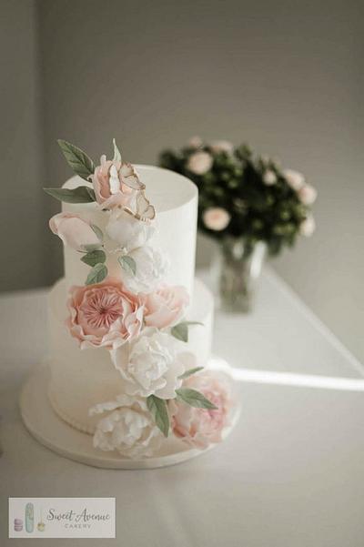 Romantic floral cascade wedding cake - Cake by Sweet Avenue Cakery