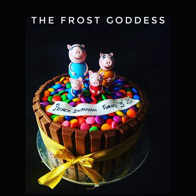 A KitKat and gems peppa pig cake  - Cake by thefrostgoddess