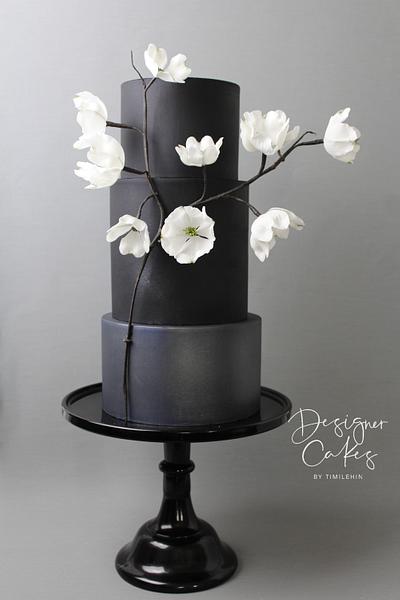 Shades of black with dogwoods - Cake by Designer Cakes By Timilehin
