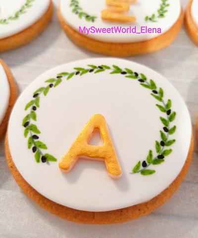 Olive branch theme cookies.  - Cake by My Sweet World_Elena