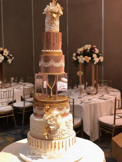 Ivory & Rose gold wedding cake  - Cake by designed by mani