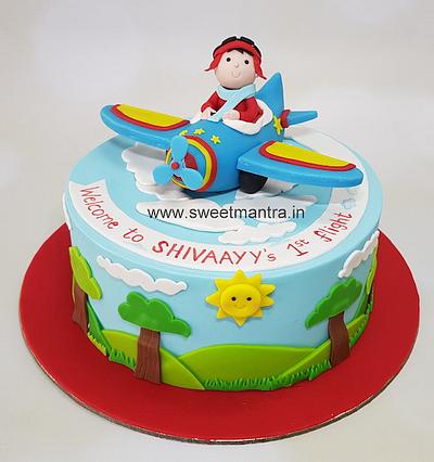 Baby on plane cake - Cake by Sweet Mantra Homemade Customized Cakes Pune