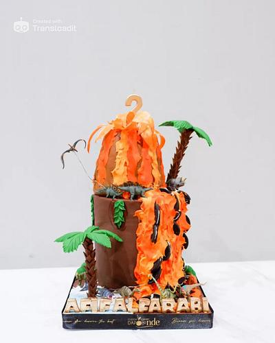 Volcano-Themed Birthday Cake with Dinosaur Toys - Cake by Dapoer Nde