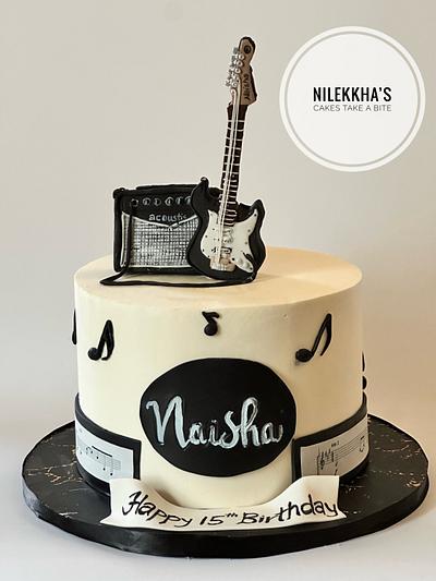 Guitar theme Cake - Cake by Nilekha's Cakes take a bite