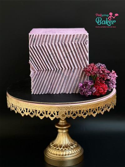 Coloured ganache origami cake with wafer paper filler flowers.  - Cake by Pinkle 