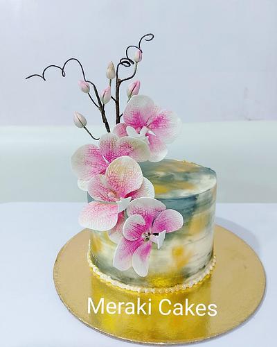 Sugar Orchids on a buttercream cake - Cake by Priya Tamuli Meraki Cakes