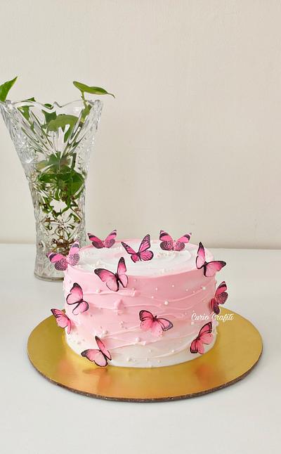 Whipped cream cake with waves pattern and edible butterflies - Cake by CurioCrafiti