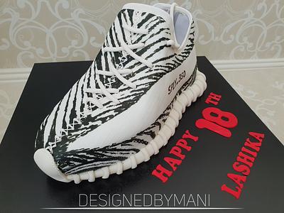 Yeezy Zebra shoe cake  - Cake by designed by mani