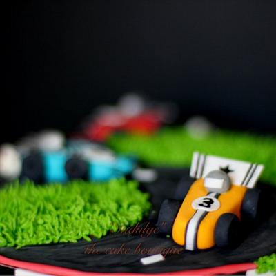 Racing cars - Cake by Indulge" the cake boutique