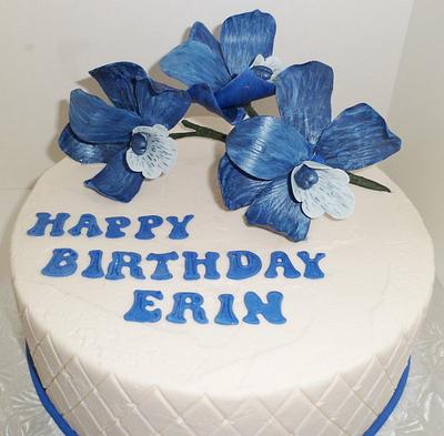 Blue Flowers on a white cake - Cake by Joyce Nimmo
