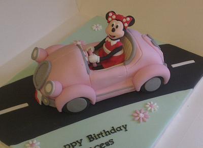 Minnie Mouse in her car cake  - Cake by FairyDelicious