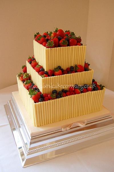 White chocolate cigarello wedding cake - Cake by ladybirdcakecompany