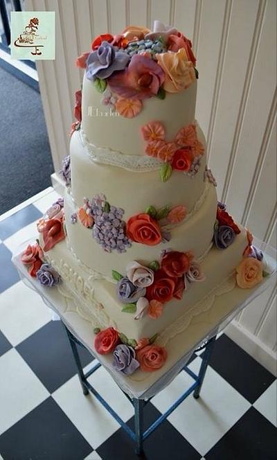 Weddingcake with colourfull flowers - Cake by Judith-JEtaarten