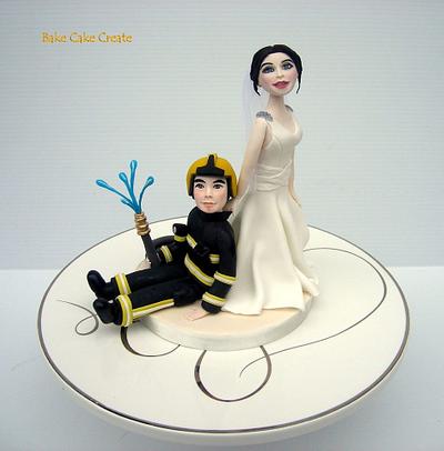 Bride dragging fireman groom - Cake by Karen Geraghty