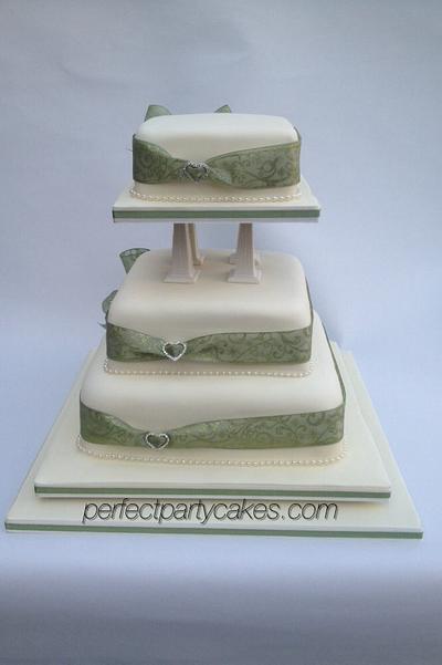 Stacked and pillared wedding cake - Cake by Perfect Party Cakes (Sharon Ward)