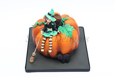 Cute witch on Pumpkin - Cake by Starry Delights