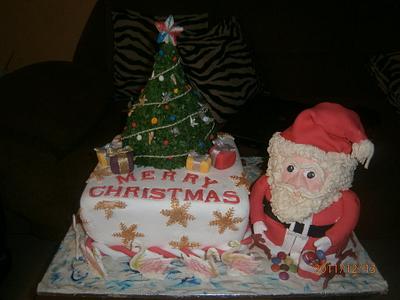 whats under the christmas tree santa? - Cake by caroline duduyemi