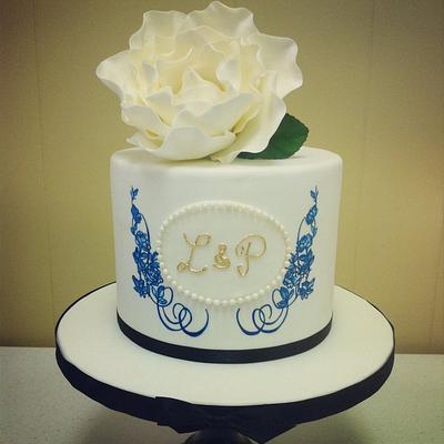 Hand painted cake in royal blue, gold monogram & white sugar rose  - Cake by Christie