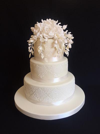 Creamy white stenciled wedding cake - Cake by Layla A