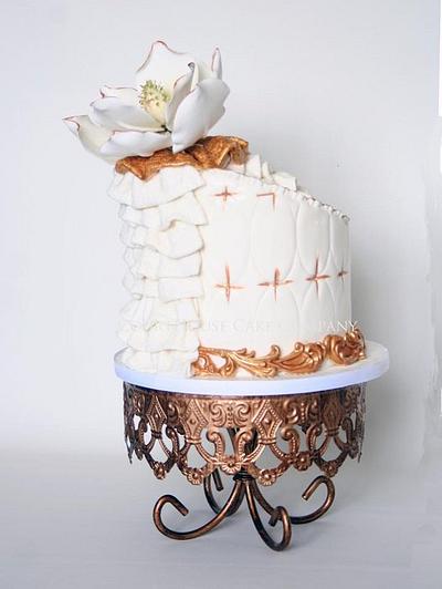 Gold edged magnolia and ruffles (of course) - Cake by CourtHouse Cake Company
