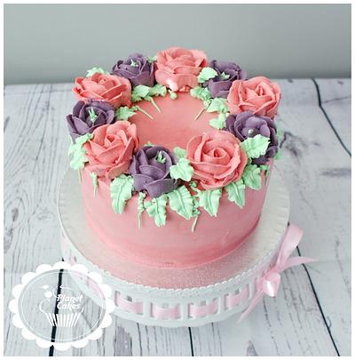 Buttercream roses - Cake by Planet Cakes