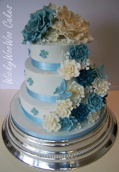 My Firsts (stacked cake, wedding cake and sugar paste roses) - Cake by WickyWooWoo Cakes
