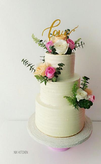 Rustic Buttercream Wedding Cake with fresh flowers - Cake by Nikita Mahmood