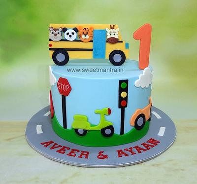 Wheels on the bus cake for 1st birthday - Cake by Sweet Mantra - Custom/Theme cake studio