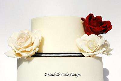 Red & White designed around a ribbon - Cake by Mirabelle Cake Design