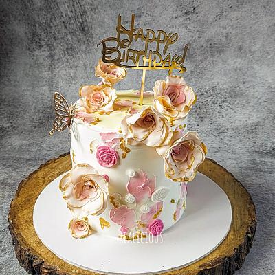 Whipped cream cake decorated with sugar flowers and palette knife work. - Cake by Realicious5