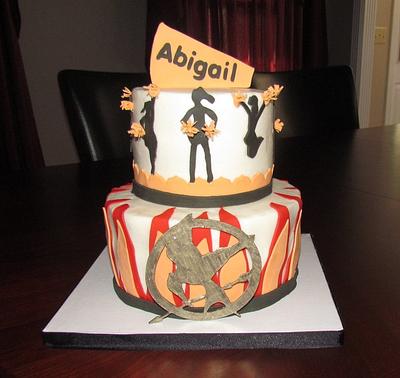 Cheerleading and Hunger Games Cake - Cake by Jaybugs_Sweet_Shop
