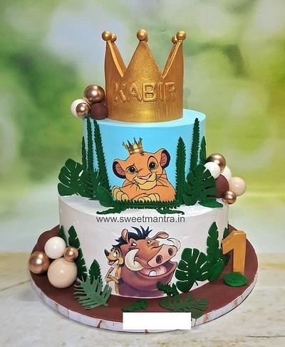 Lion King 2 tier cake for 1st birthday - Cake by Sweet Mantra Homemade Customized Cakes Pune