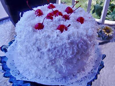Fresh coconut cake with pineapple filling  - Cake by Nancys Fancys Cakes & Catering (Nancy Goolsby)