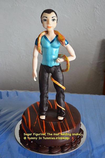The man and the snake topper. ( Sugar Figurine.) - Cake by Yummy In Tummies. 