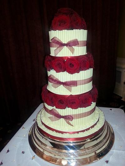 Cigarello tiered cake with fresh roses - Cake by Millyscakes