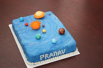 Solar system cake - Cake by Classic Cakes by Sakthi