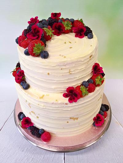 White chocolate and raspberry cake. - Cake by claire cowburn