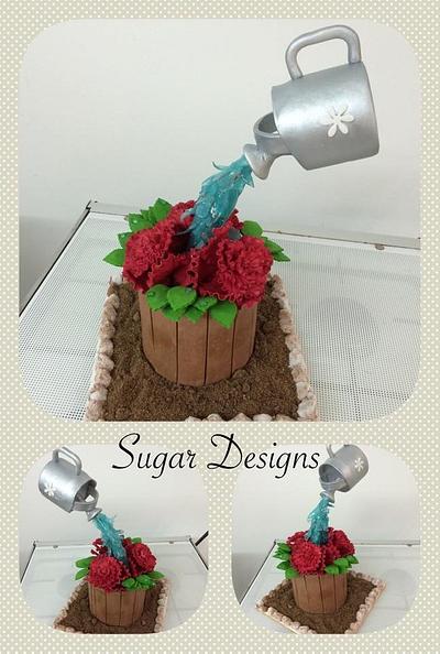 Watering the flowers - Cake by Sugar Designs