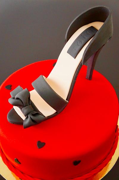 shoes on a red cake - Cake by Arletta