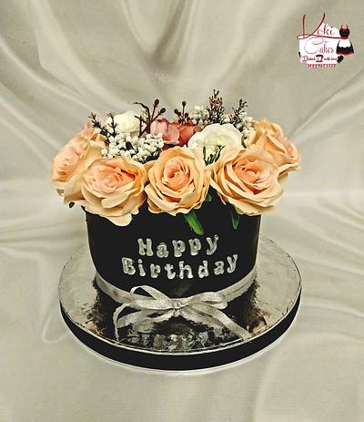 "Flowers gift box cake" - Cake by Noha Sami