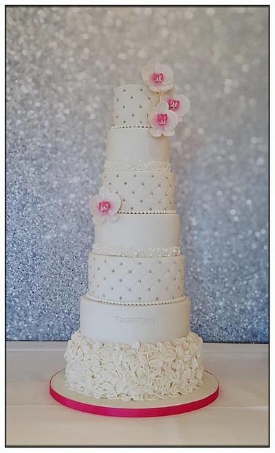 7 Tier Wedding Cake with ruffles and Orchids - Cake by Taaartjes